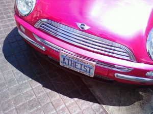 Penn Jillette's Pink Mini Cooper with Nevada Atheist vanity plates | Image via Flicker user  Thomas Anderson